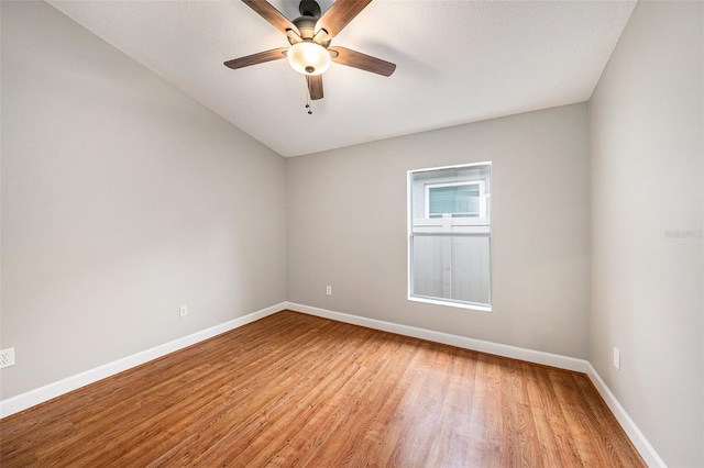 empty room featuring light hardwood / wood-style flooring and ceiling fan