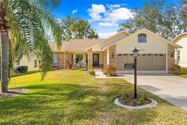 ranch-style house with a garage and a front yard