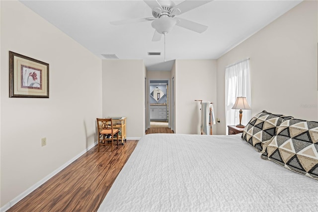 bedroom with hardwood / wood-style flooring and ceiling fan