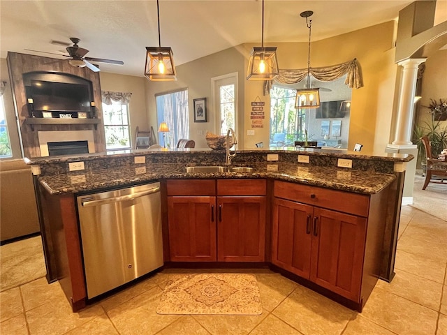 kitchen with dishwasher, sink, a center island with sink, and decorative light fixtures