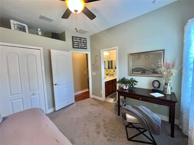 office area featuring light colored carpet and ceiling fan