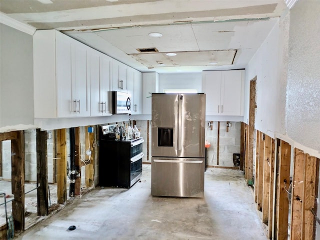 kitchen featuring white cabinetry and appliances with stainless steel finishes