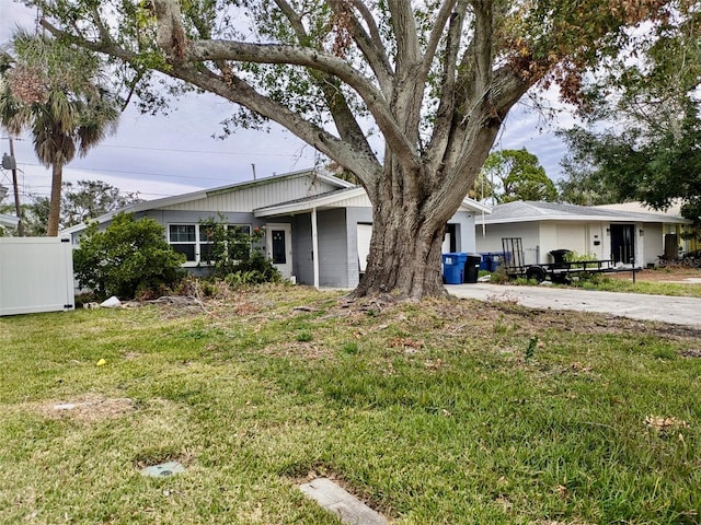 exterior space featuring a front lawn