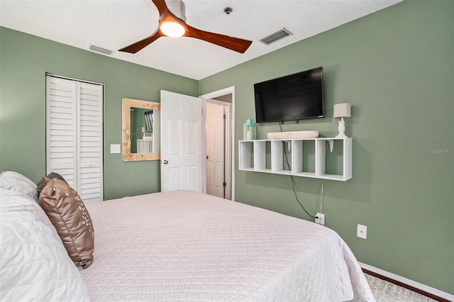 bedroom with a closet and ceiling fan