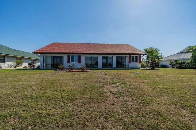 view of front of home with a front yard