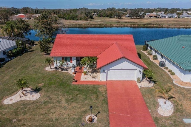 drone / aerial view featuring a water view