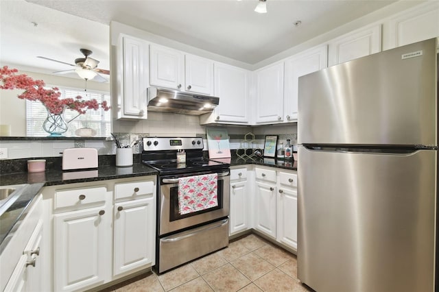 kitchen with ceiling fan, tasteful backsplash, white cabinetry, light tile patterned floors, and stainless steel appliances