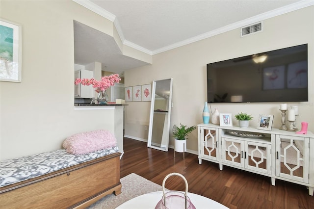 bedroom featuring ornamental molding and dark wood-type flooring