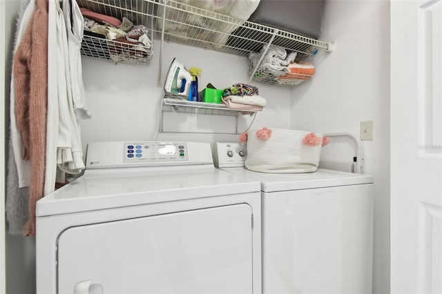 laundry room with washer and dryer