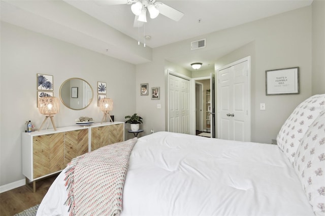 bedroom featuring a closet, ceiling fan, and dark hardwood / wood-style flooring