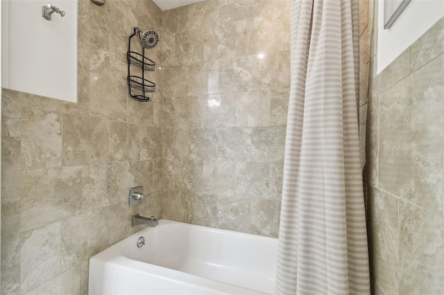 bathroom with shower / tub combo