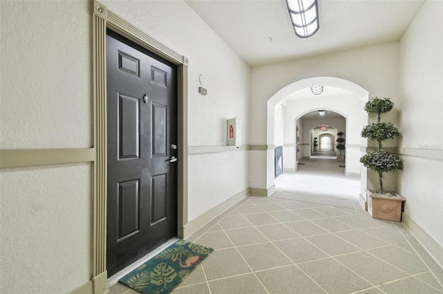 interior space with light tile patterned floors