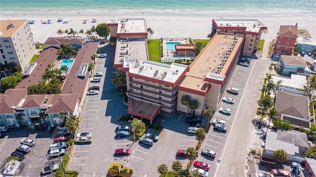 bird's eye view with a view of the beach and a water view