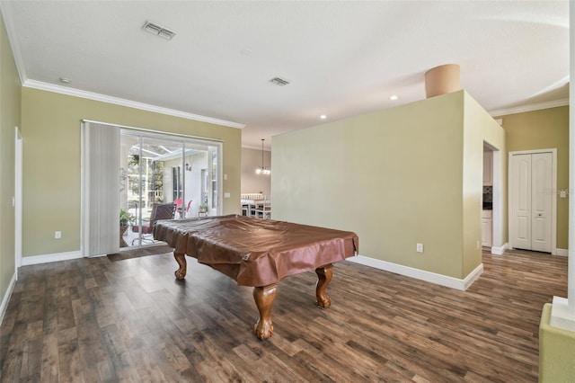 rec room with billiards, dark hardwood / wood-style flooring, and ornamental molding