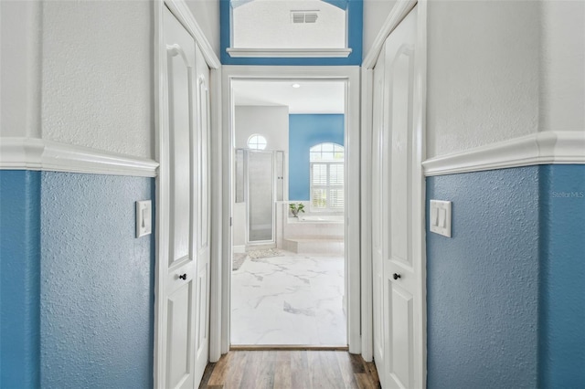 hall featuring hardwood / wood-style flooring