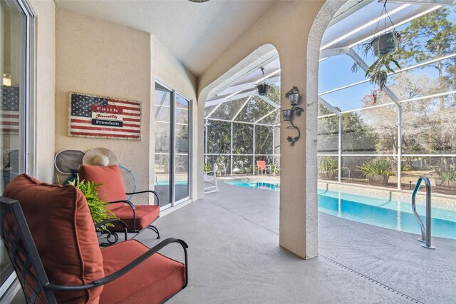 view of pool featuring a lanai and a patio area