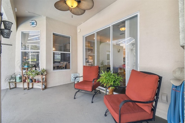 view of patio with ceiling fan