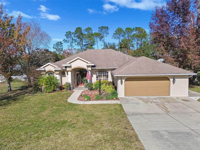 ranch-style home with a garage and a front yard