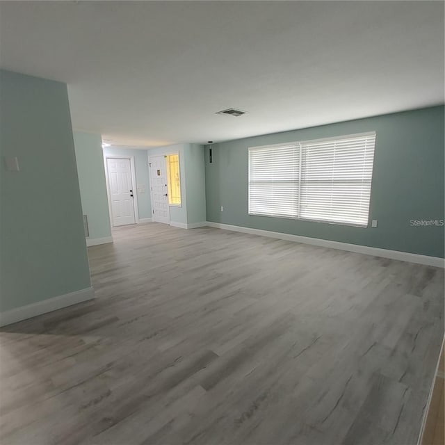 empty room featuring light wood-type flooring