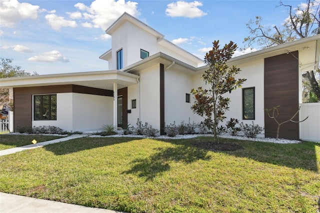 contemporary house with a front yard