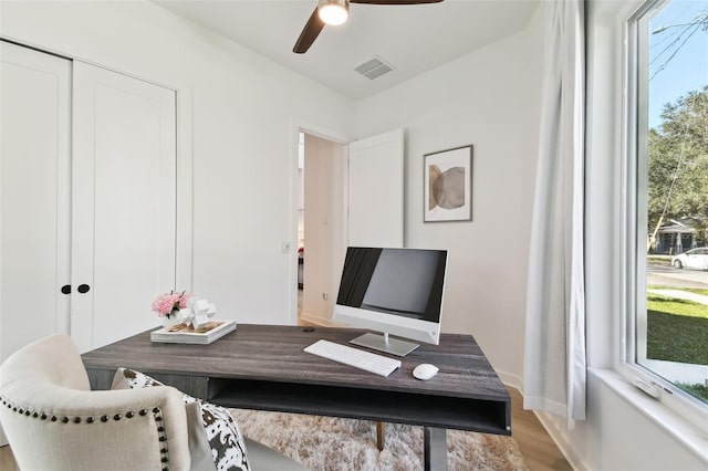 office area featuring ceiling fan and light hardwood / wood-style floors