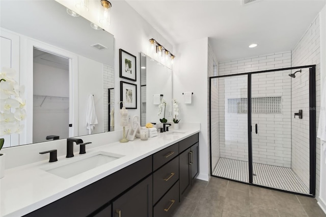 bathroom featuring vanity and walk in shower