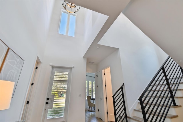 foyer entrance featuring a high ceiling