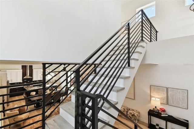 stairs with wood-type flooring