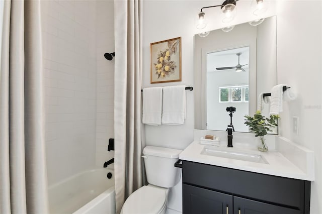 full bathroom featuring vanity, shower / tub combo, and toilet