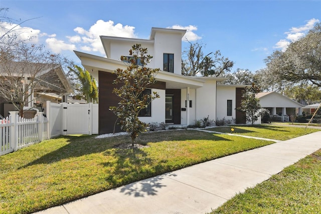 modern home with a front yard