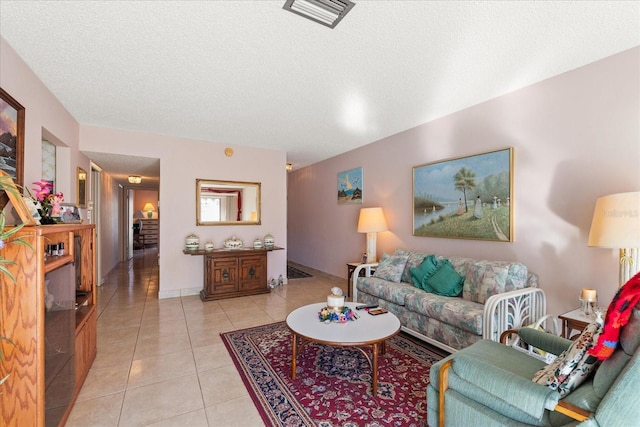 living room with light tile patterned floors