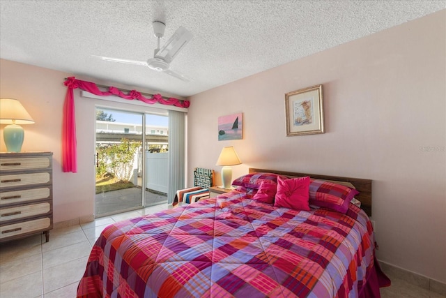 tiled bedroom with access to exterior, a textured ceiling, and ceiling fan