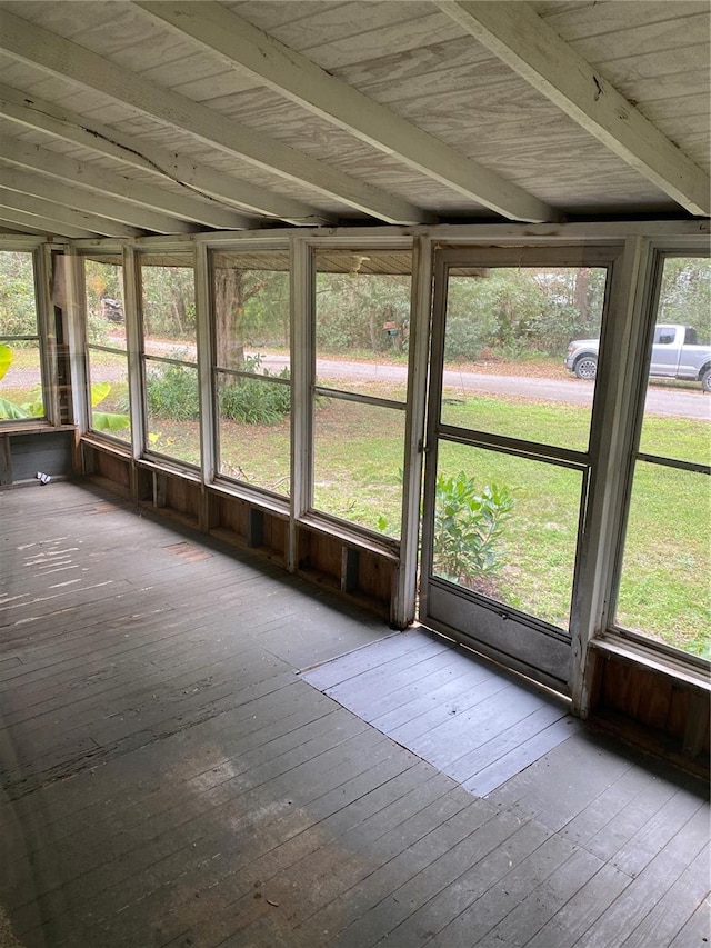 unfurnished sunroom with a healthy amount of sunlight