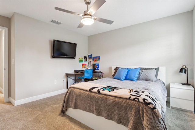 bedroom featuring ceiling fan and light colored carpet