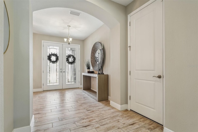 foyer featuring french doors