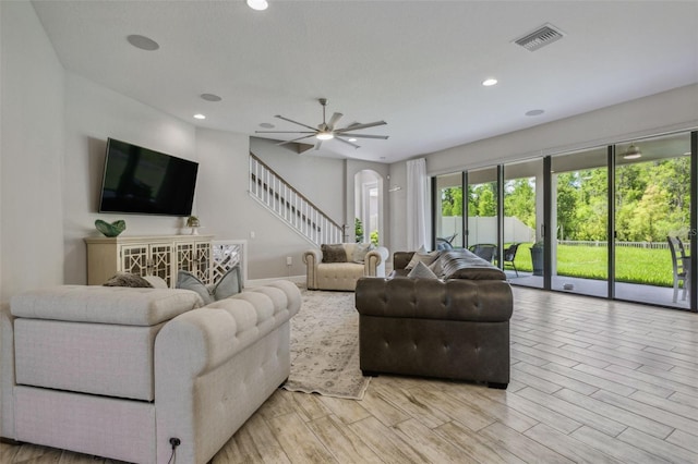 living room featuring ceiling fan