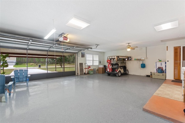garage featuring a garage door opener