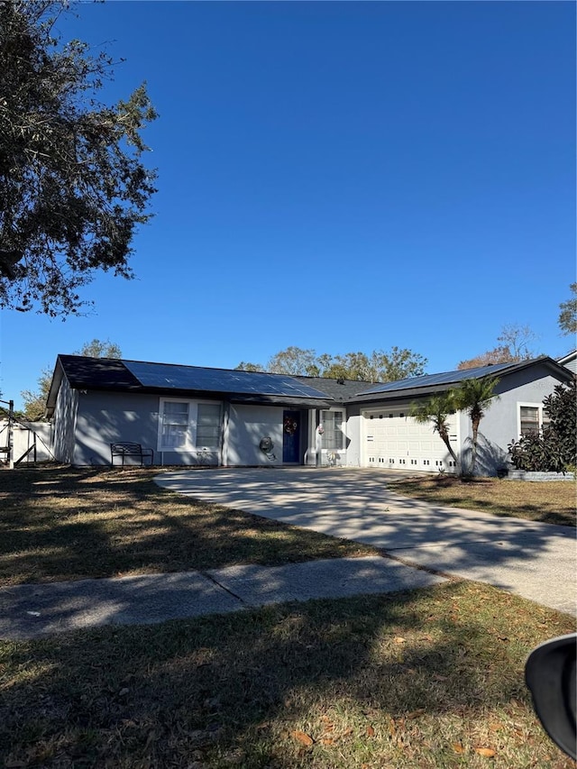 ranch-style house with a garage