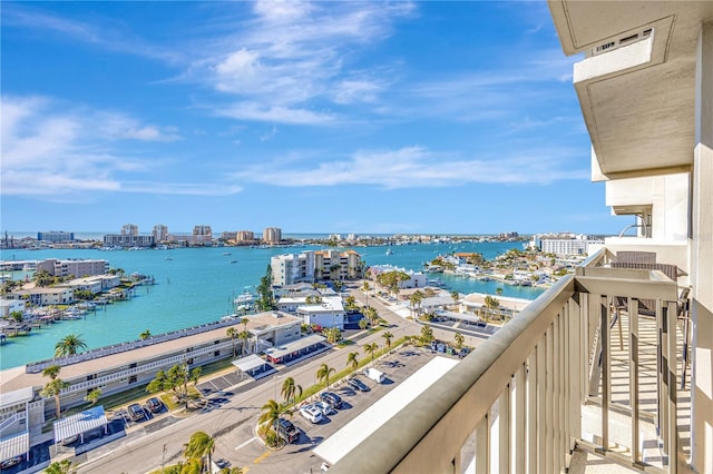 balcony featuring a water view