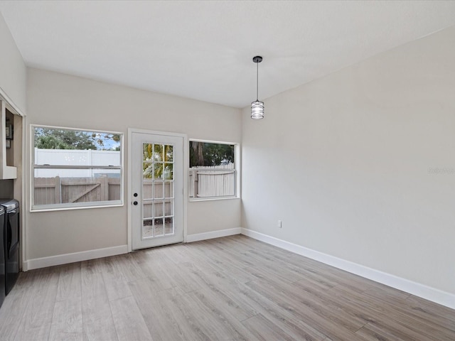 interior space with light hardwood / wood-style floors