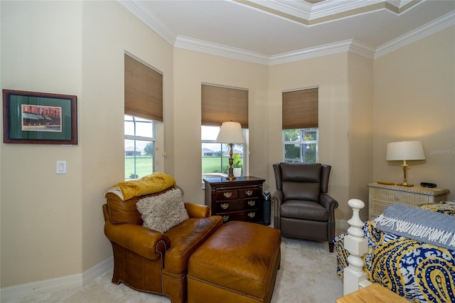 living area with light carpet, a wealth of natural light, and ornamental molding