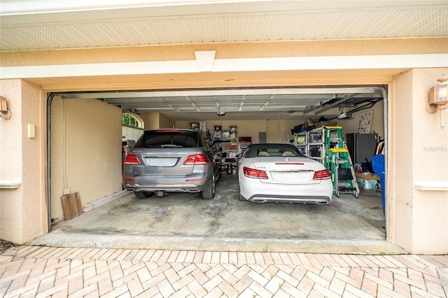 garage featuring a garage door opener