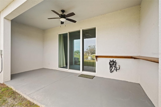 view of patio / terrace with ceiling fan