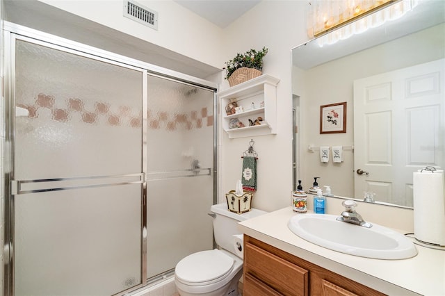 7312 7th Ave NW, Bradenton, FL 34209 - full bathroom featuring vanity, a stall shower, and toilet