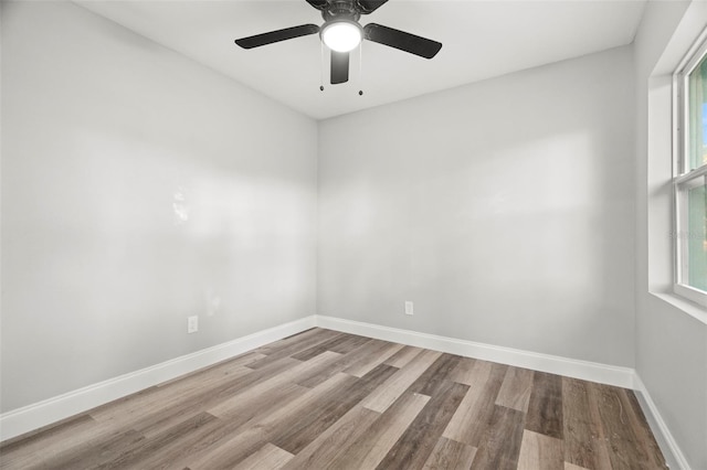 unfurnished room with ceiling fan and light hardwood / wood-style floors