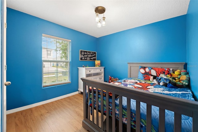 bedroom featuring light hardwood / wood-style flooring