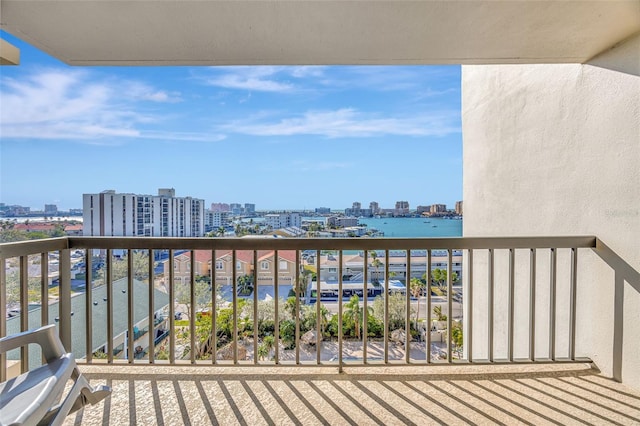 balcony with a city view and a water view