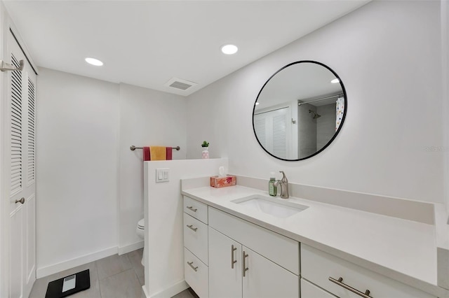 full bath featuring visible vents, toilet, vanity, a closet, and recessed lighting