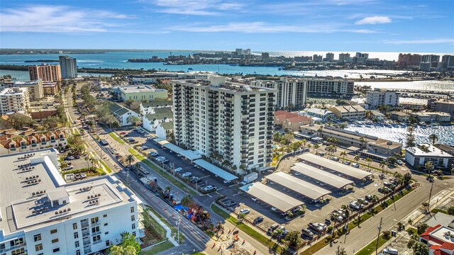 drone / aerial view with a view of city and a water view