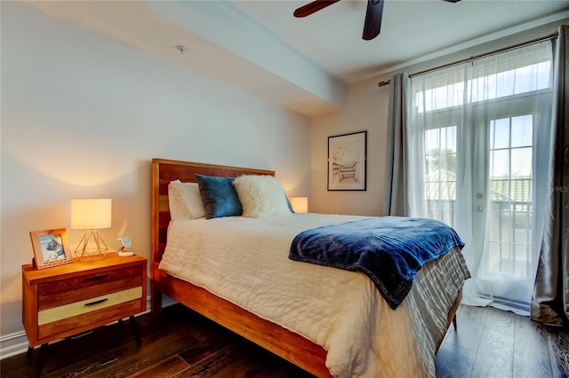 bedroom featuring dark hardwood / wood-style floors, access to exterior, and ceiling fan